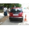 DMart KPHB Colony - People parking vehicles in front of the residential house
